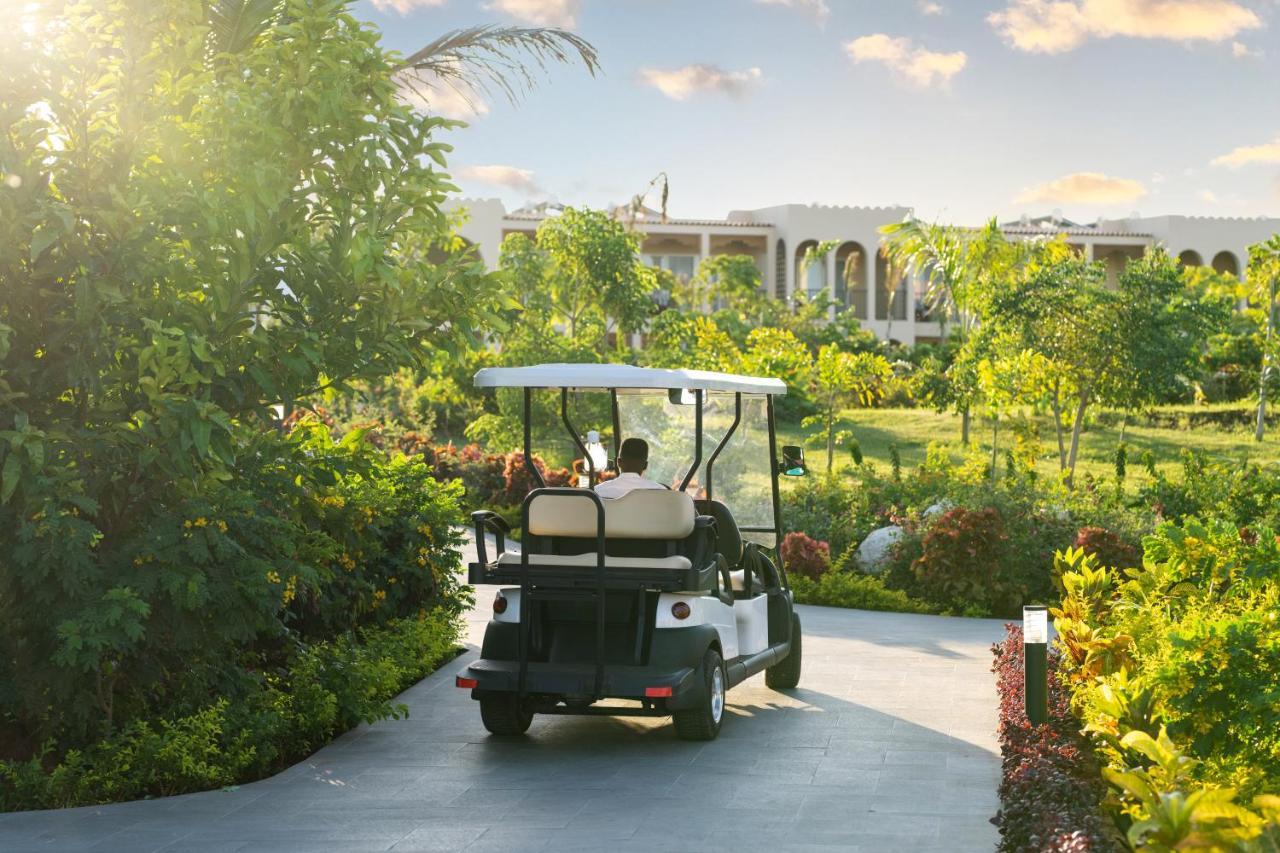 Отель The Mora Zanzibar Матемве Экстерьер фото Golf cart at the Four Seasons Resort