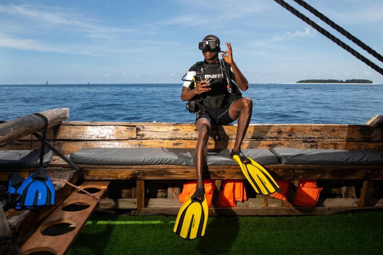 Отель The Mora Zanzibar Матемве Экстерьер фото Scuba diver with a pair of open heel fins